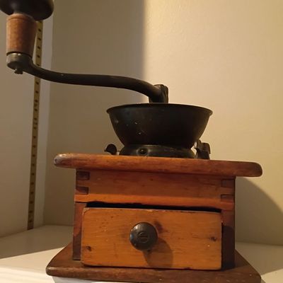 Antique wood coffee grinder with drawer