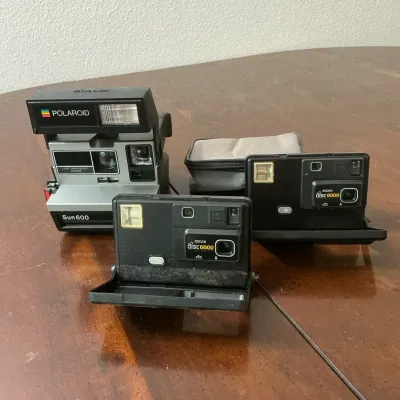 Polaroid Sun 600 & 2 Kodak Disc 6000 