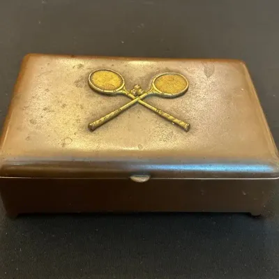 Vintage brass-toned decorative trinket box - tennis rackets 