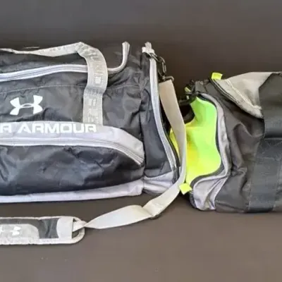 Under Armour & Gill athletic duffle bags 