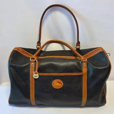 Vintage Dooney & Bourke All-Weather Leather duffel or overnight travel bag