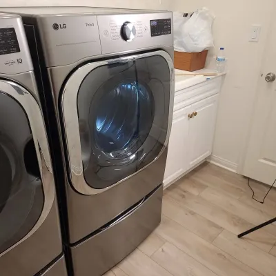LG 9.0 cu. ft. Mega Capacity Smart Wi-Fi Enabled Front Load Electric Dryer with Pedestal