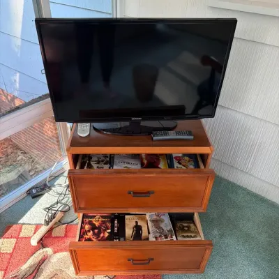 Samsung Flat-Screen TV with Wood Media Cabinet & DVD Collection