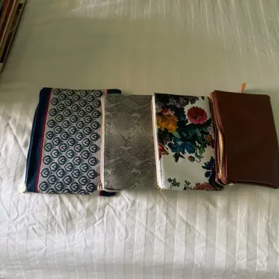 Assorted Women’s Clutch & Cosmetic Bags – Floral, Snakeskin & More