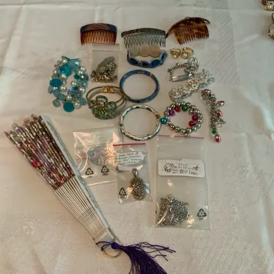 Assorted Costume Jewelry & Accessories Lot with Bracelets, Necklaces, Rings, Hair Combs & Fan