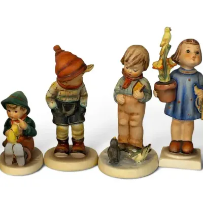Goebel Hummel Figurine Collection (6) – “Congratulations,” “March Winds,” “Singing Lesson” & More