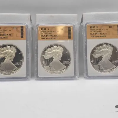 Sale Photo Thumbnail #105: 2162 3 1990 1992 american silver eagle dollars