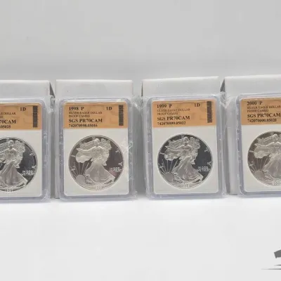 Sale Photo Thumbnail #107: 2166 4 1997 2000 american silver eagle dollars