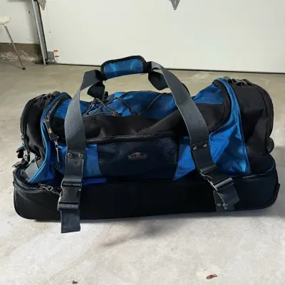 2 Ricardo Beverly Hills Rolling Duffel Bags