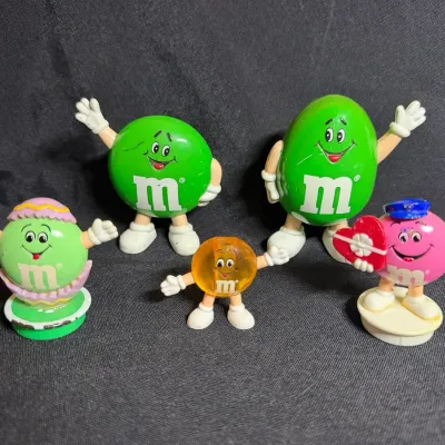 Vintage M&M's Collectible Plastic Figurines Lot - Green, Pink Valentine, Easter Egg & Amber Mini