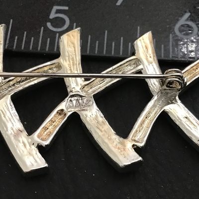 Signed Crystal XXX Brooch