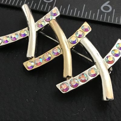 Signed Crystal XXX Brooch