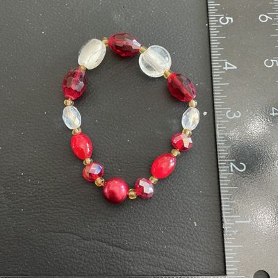 Sale Photo Thumbnail #135: Multi colored glass Beaded stretchy bracelet 
Please see attached pictures