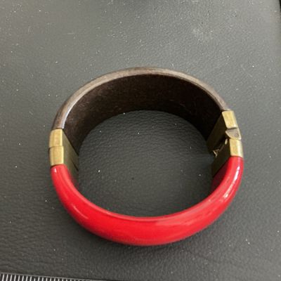 Sale Photo Thumbnail #155: Very nice Vintage lucite type and wood type hinged fashion bracelet 
Please see attached pictures