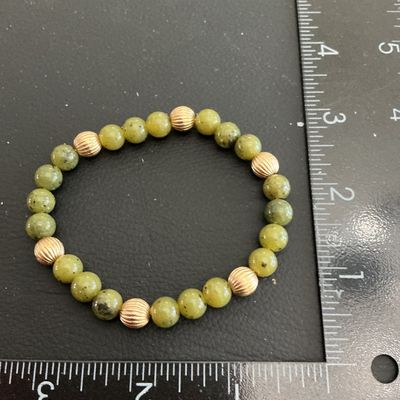 Sale Photo Thumbnail #162: Very nice Vintage Green agate stretchy bracelet 
Please see attached pictures