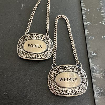 Very cool vintage whiskey bottle tag charms