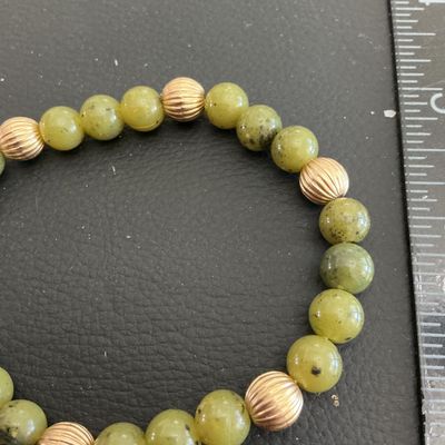Sale Photo Thumbnail #164: Very nice Vintage Green agate stretchy bracelet 
Please see attached pictures