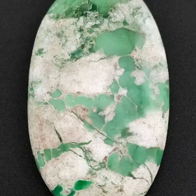 30.4ct Lucin Varisite Oval Cabochon 