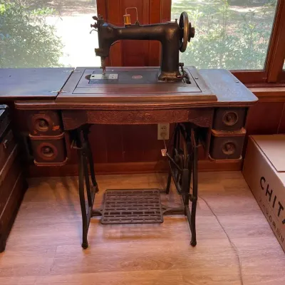Antique Treadle Sewing Machine with Ornate Oak Cabinet & Cast-Iron Base