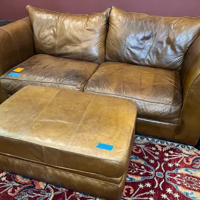 Rustic Brown Leather Sleeper Sofa With Matching Ottoman