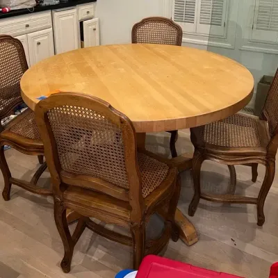 Round Wooden Dining Table With 4 Carved Wood Cane Back & Seat Dining Chairs