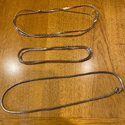Gold tone necklaces
