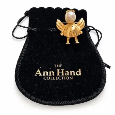Lot 043  
Ann Hand Collection Gold-Tone Angel Brooch