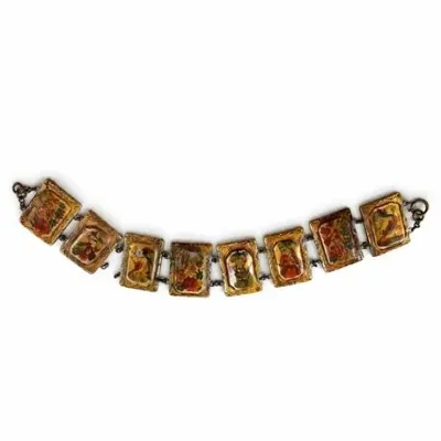 Lot 044   
Antique Persian Story Panel Bracelet with Mother of Pearl