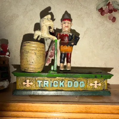 Sale Photo Thumbnail #92: Cast-Iron Mechanical Bank called the TRICK DOG Bank