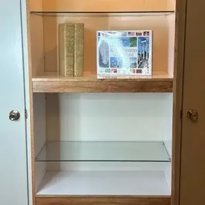 Lighted Wooden Bookcase And Books 