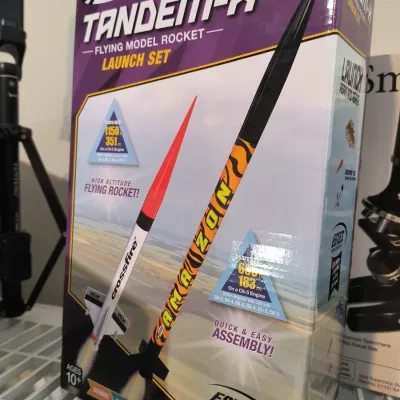 Estes Tandem-X flying model rocket launch set, in its original retail box showing the Crossfire and Amazon rockets.