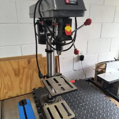 Porter-Cable benchtop drill press, showing light use and in clean, functional condition.