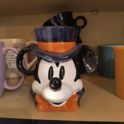 Vintage Disney Mickey Mouse ceramic mug featuring Mickey in a top hat and bow tie, in excellent condition.