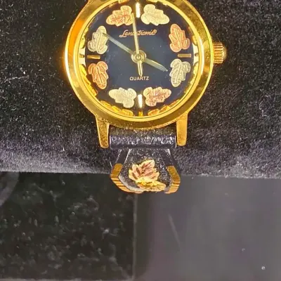 Landstroms Black Hills Gold Powder Coated Ladies Watch with 12K Gold Leaves Trim