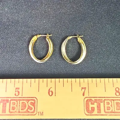 14k Yellow Gold Oval Twist Hoop Earrings. Weight 7g