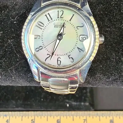 Citizen Eco-Drive Women's Stainless Steel Watch Featuring Mother-of-pearl Dial with Crystal-Accent