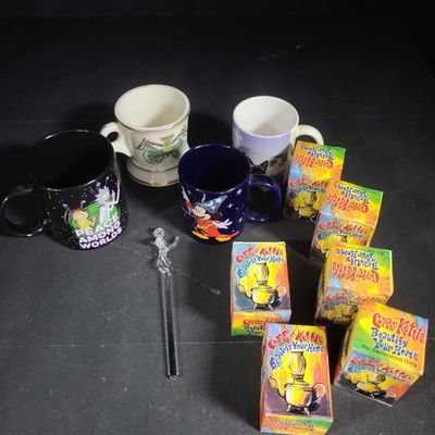 Sale Photo Thumbnail #953: I04674 | An Assortment of Collectible Mugs