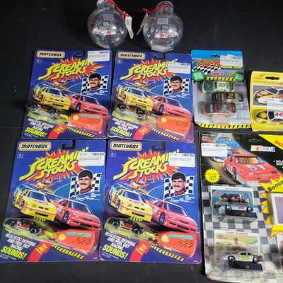 Sale Photo Thumbnail #868: I04755 | An Assortment of NASCAR Die-Cast Toys