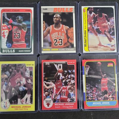 Sale Photo Thumbnail #520: I03293 | Six REPRINT Michael Jordan Vintage Basketball Trading Cards Including 1986-87 Fleer
