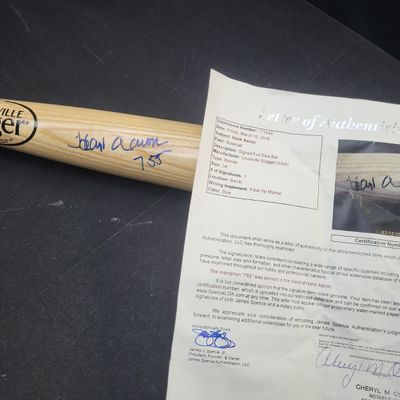 Sale Photo Thumbnail #652: I04110 | Hank Aaron Signed Louisville Slugger Bat