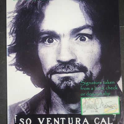 Sale Photo Thumbnail #52: I04356 | Charles Manson Signed Relic Card