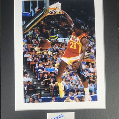 Sale Photo Thumbnail #736: I04390 | Dominique Wilkins Autographed Basketball Photograph