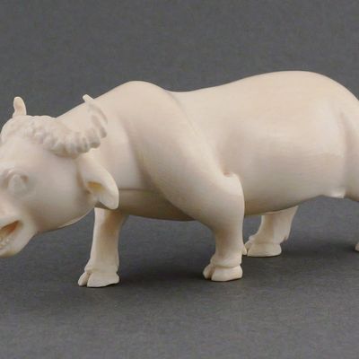 Sale Photo Thumbnail #186: African Carved Ivory Water Buffalo Figure
