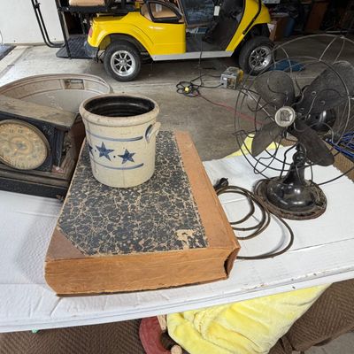 Sale Photo Thumbnail #51: An Assortment of Antique and Vintage Items including an Ansonia Mantel Clock, Robbins and Myers Fan, and Newspaper Archive