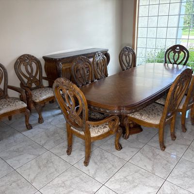 Sale Photo Thumbnail #17: Michael Amini Signature Series by AICO Contemporary Traditional Dining Suite Comprising an Extension Pedestal Table a Set of Upholstered Chairs and a Marble Top Buffet