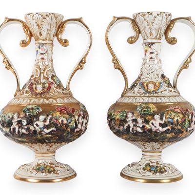 Sale Photo Thumbnail #5: A Pair of Capodimonte Polychrome and Gilded Two-Handle Porcelain Vases