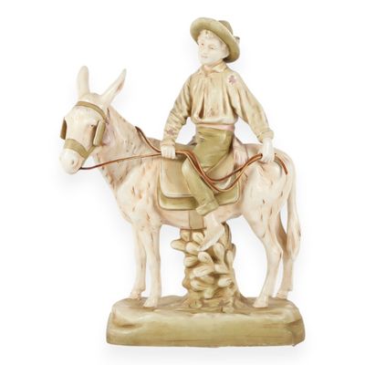 Sale Photo Thumbnail #6: Large Austrian Bisque Porcelain Figurine of a Boy Riding a Donkey