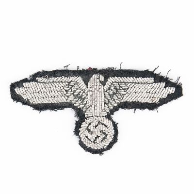 Sale Photo Thumbnail #171: WWII German Waffen-SS Sleeve Eagle Patch