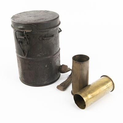Sale Photo Thumbnail #111: WWI German Gas Mask Canister & Trench Art
