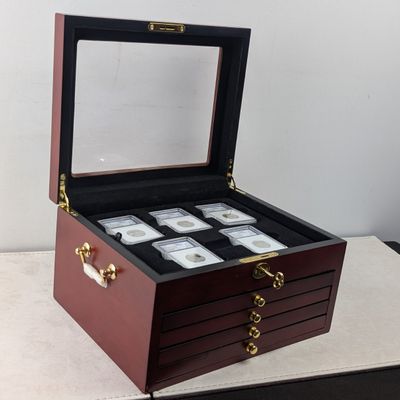 Sale Photo Thumbnail #215: (5) 2010-S PROOF Various ATB Silver Quarters - All IGS Graded Cert. PR70 DCAM & (9) 2010-P&D and 2011-P Various ATB Quarters - All ANACS Cert. MS67 in Nice Wooden Display Box That Hold 20 Slabs w/ COA & Key (14 Coins Total - Ceremony Release)